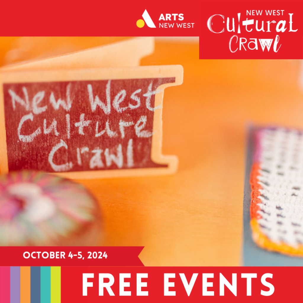 A tiny easel tipped onto it's side on an orange tabletop with white chalk reads: New West Cultural Crawl. The Arts New West and New West Cultural Crawl logo are featured