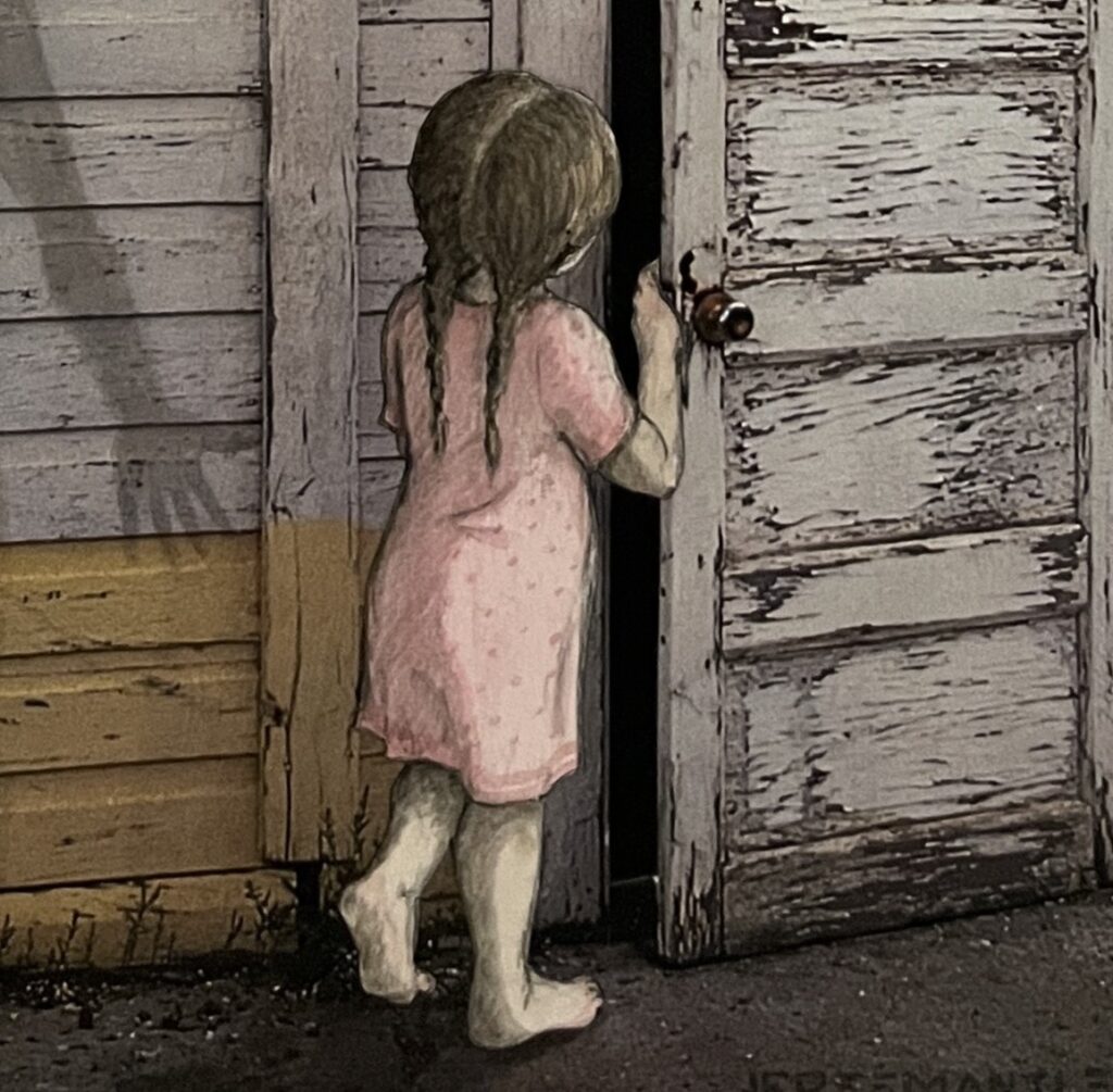 A child wearing a pink nightdress opens a white wooden door. On the wooden wall behind her is a shadowy hand.