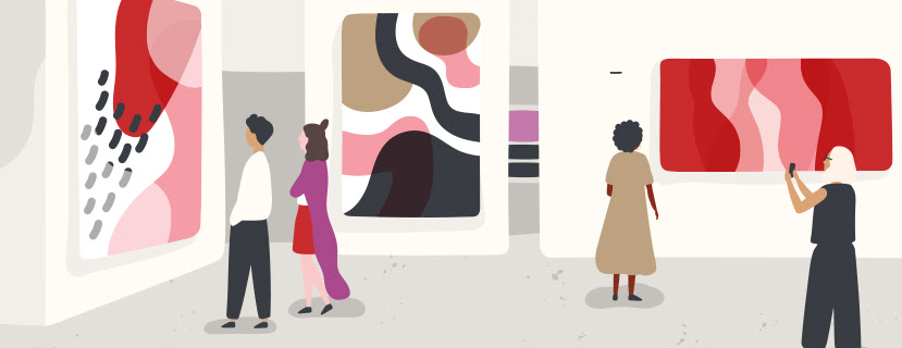 People walk through a white and grey gallery with pink and red art work on the walls.