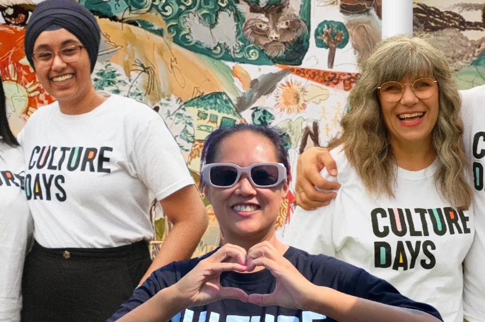 People wearing white and black shirts with the Culture Days logo